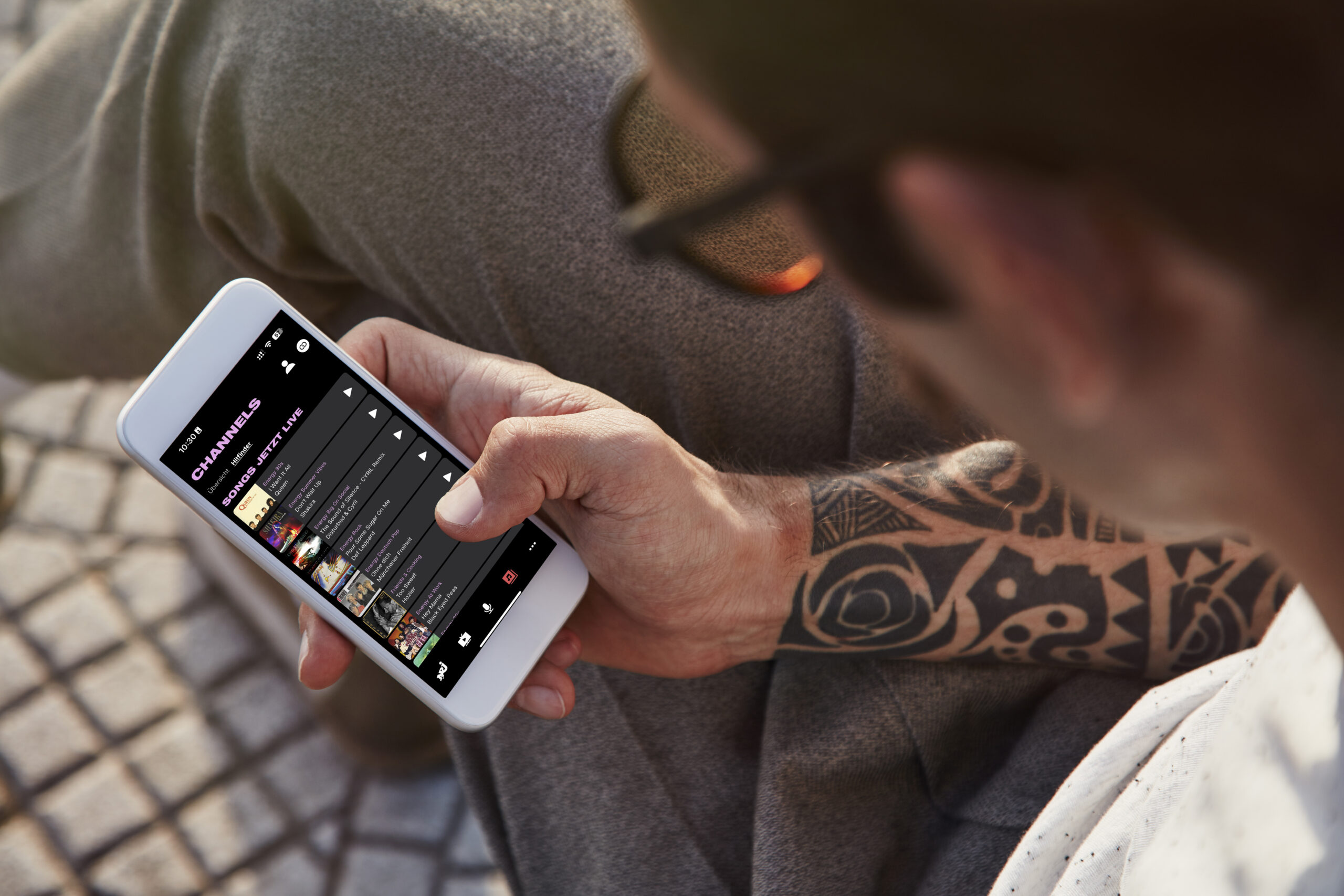 Hipster Men Using Smartphone at Park