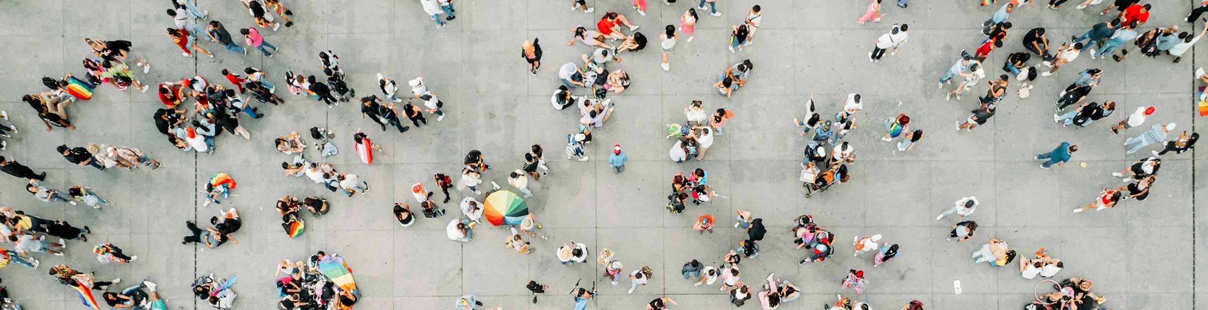 Top view of a picture of people in a square.